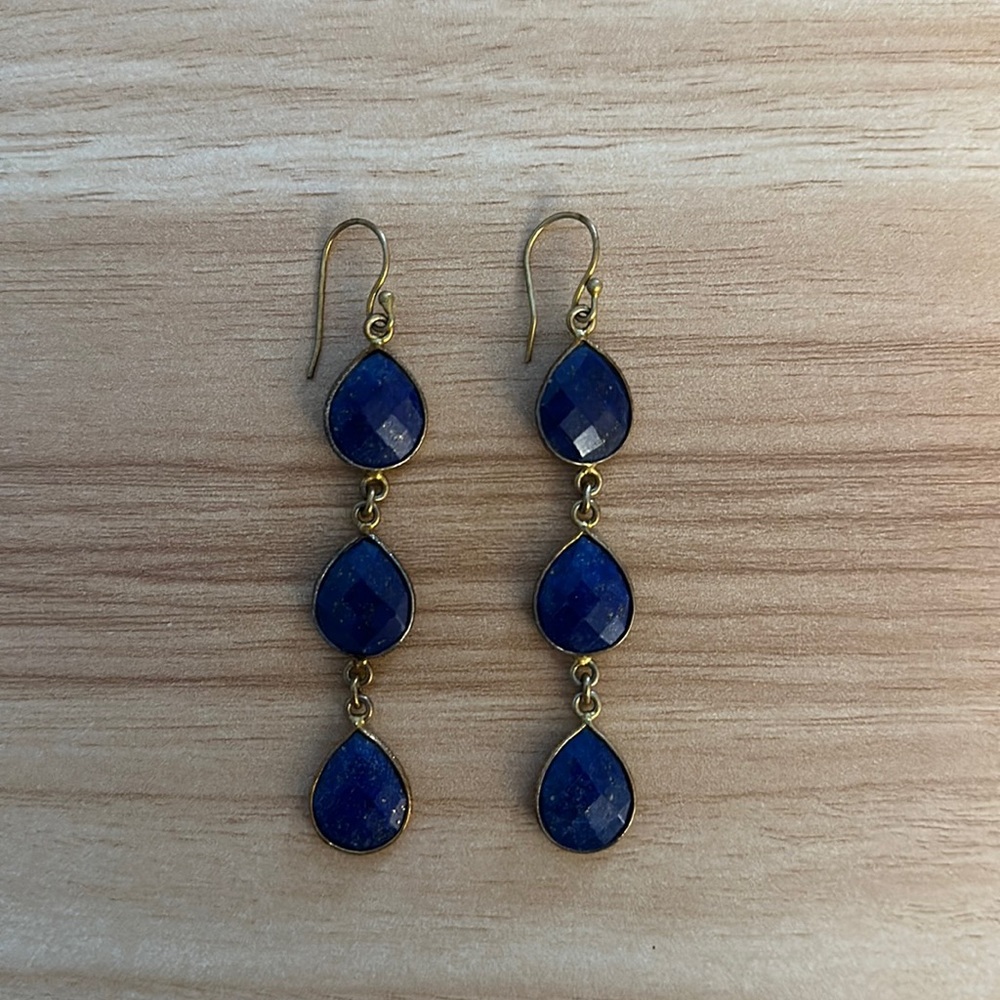 Blue stone and brass earrings.